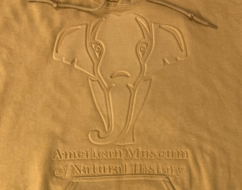 Adult AMNH Gold Embossed Elephant Hoodie closeup