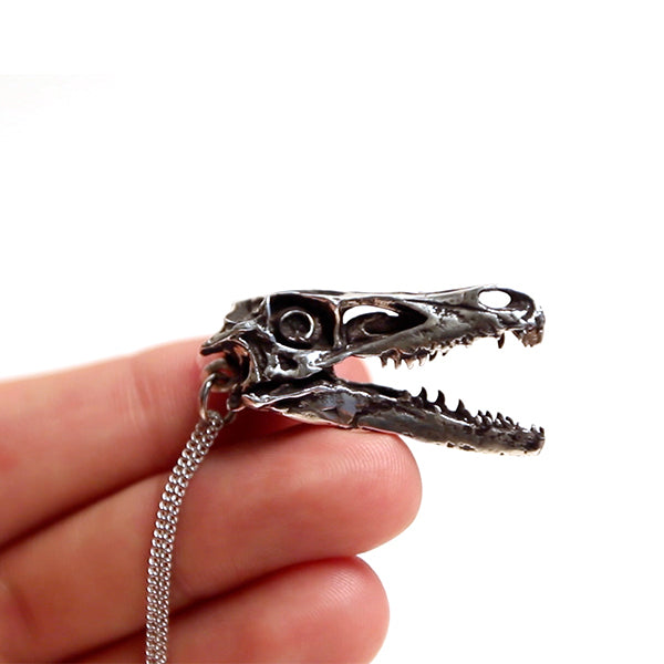 White Bronze Velociraptor Necklace with Display Base